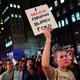 Protestors march through midtown Manhattan on October 1, 2018 in New York